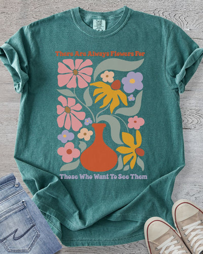 Comfort Colors t-shirt in Blue Spruce featuring floral design and text.