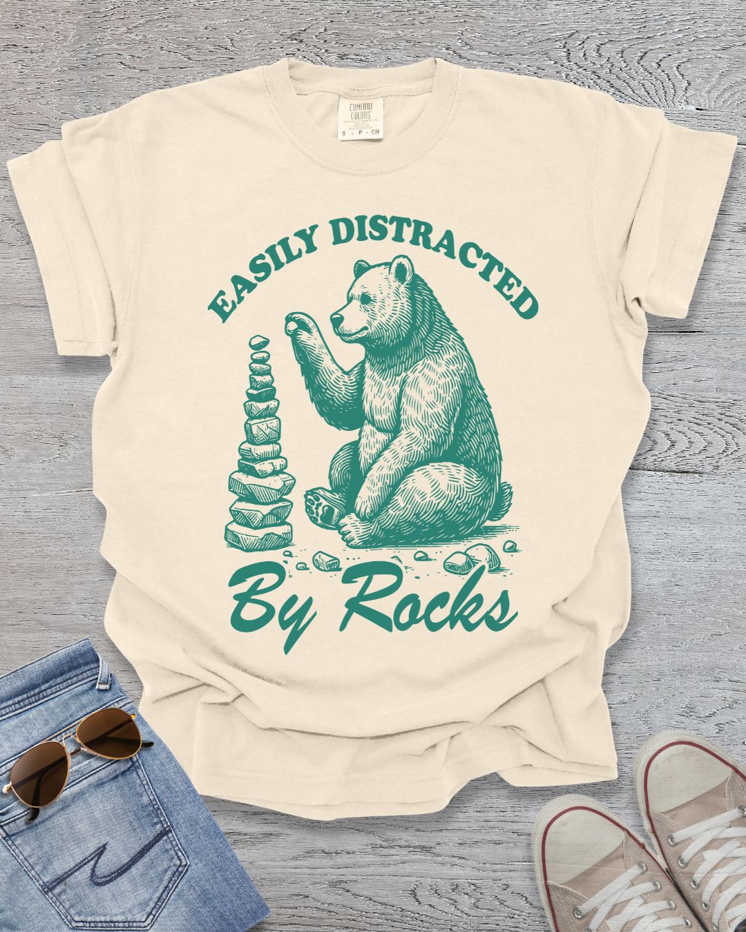 Easily Distracted by Rocks Premium Tee