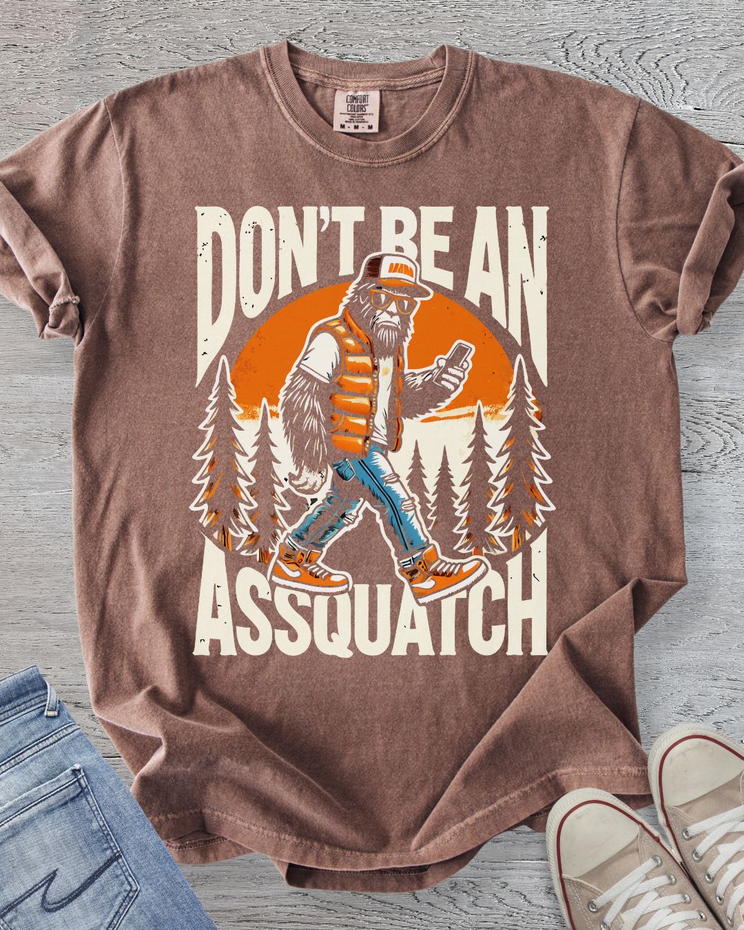 Comfort Colors premium tee in Espresso with  graphic of Sasquatch. 
