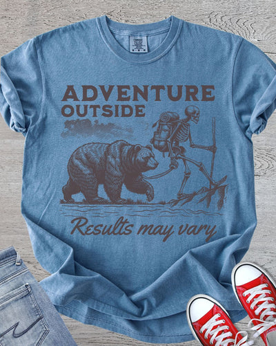 Humorous hiking tee featuring skeleton walking a bear in Comfort Colors Blue Jean