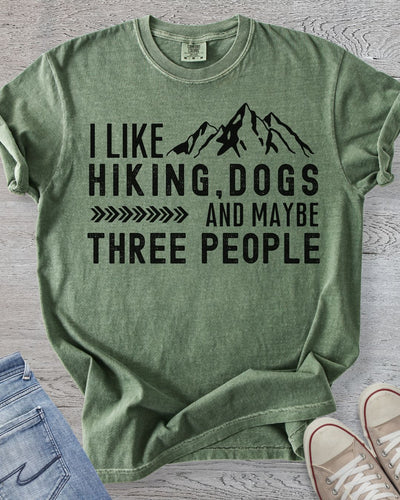 Hking t-shirt in Comfort Colors Moss featuring the phrase"I Like Hiking, Dogs, and Maybe 3 people"