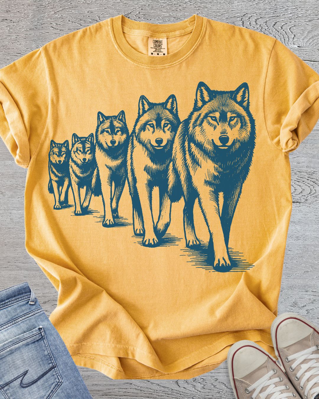 Pack of wolves on Comfort Colors Tee in Mustard